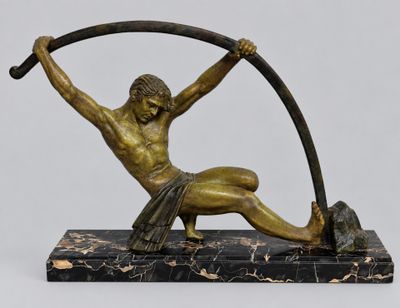 an image of a bronze statue of a man holding a pole