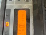 a close up of a remote control in a car