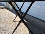 a table that is sitting on the ground outside