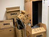 a pile of boxes that are sitting in the corner of a room