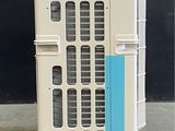 a small air conditioner sitting on a pallet