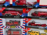 many different types of toy trucks in the box