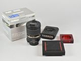 a camera lens, a flash drive, and a box of lenses