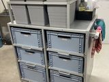 a cart that has many drawers on top of it
