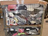 a metal cart with many items in it in a warehouse