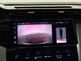 an image of a car ' s dashboard with a camera mounted on it