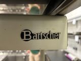a sign that says bartsder on it in a kitchen