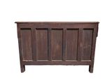an old wooden bed frame with a wooden headboard on top of it