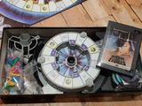 a board game set up on a wooden table