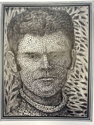 a black and white photo of a man ' s face made out of pebbles