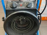 an image of a portable heater sitting on the floor