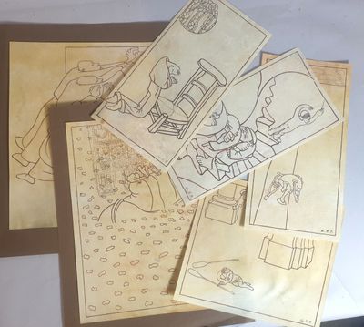 quatre cartes illustrées posées sur une table