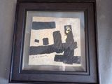 tableau représentant un homme assis sur un banc devant un mur