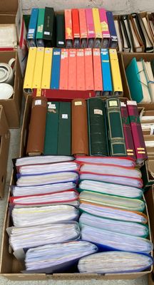 many boxes of books sitting on the floor next to each other
