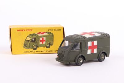 toy army vehicle with red cross on front and box in background