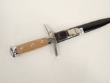 a knife that is laying on top of a table