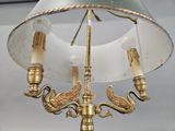 a lamp that is hanging from the ceiling in the room
