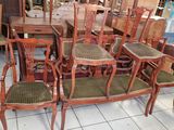 a lot of chairs and tables in a room