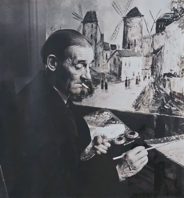 painting of an old man smoking a cigarette in front of a windmill