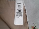 a label that says burberry on a piece of fabric