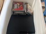 a white box with a game system inside of it
