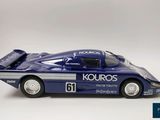 the toy car is blue and white with numbers on it