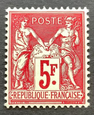 un timbre rouge et blanc sur lequel figurent deux femmes