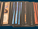 a lot of cards that are sitting on top of each other
