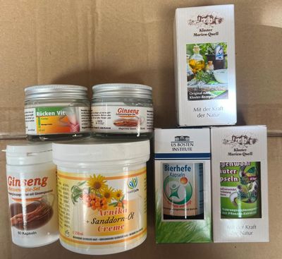 many different types of creams in a cardboard box