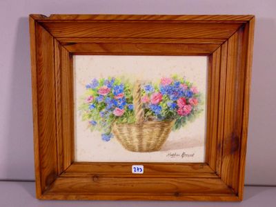 painting of a basket of flowers in a wooden frame on a table