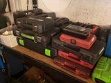 many different tools on a shelf in a garage