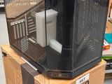 a box with a computer on top of it in a store