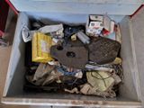 a box full of assorted items sitting on the floor