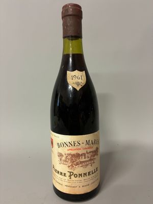 a bottle of wine that is sitting on a table