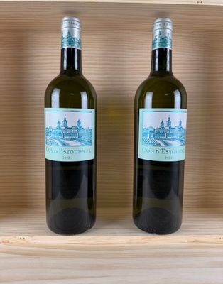 two bottles of wine sitting on top of a wooden shelf