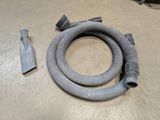 an image of a vacuum hose and a hose on a floor