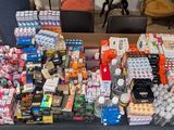 a table with a lot of candy and candy bars on it