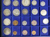 a display case with a lot of coins in it