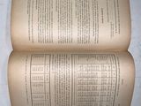 an open book that is sitting on a table