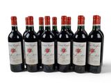 six bottles of red wine are lined up in a row