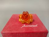 a red box with a yellow flower on top of it