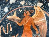 an image of a man holding a tray with a bird on it