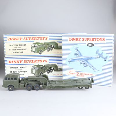 a toy truck and a toy airplane on a table