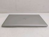 an image of a laptop computer sitting on top of a white table