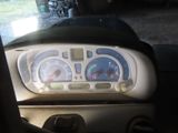 a picture of a car dashboard with a speedometer and gauges