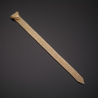 Bracelet en or jaune 750°°° (tête d'aigle) de forme ceinture…