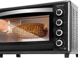an image of a toaster oven with a ham in it