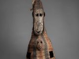 an image of a horse head made out of a piece of wood