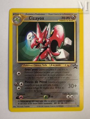 a close up of a pokemon card on a white surface