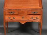 an old wooden desk with two drawers and a drawer underneath it